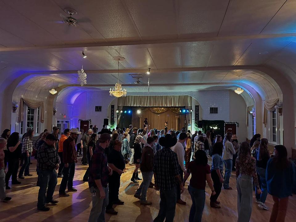 more than a hundred people dancing on dance floor